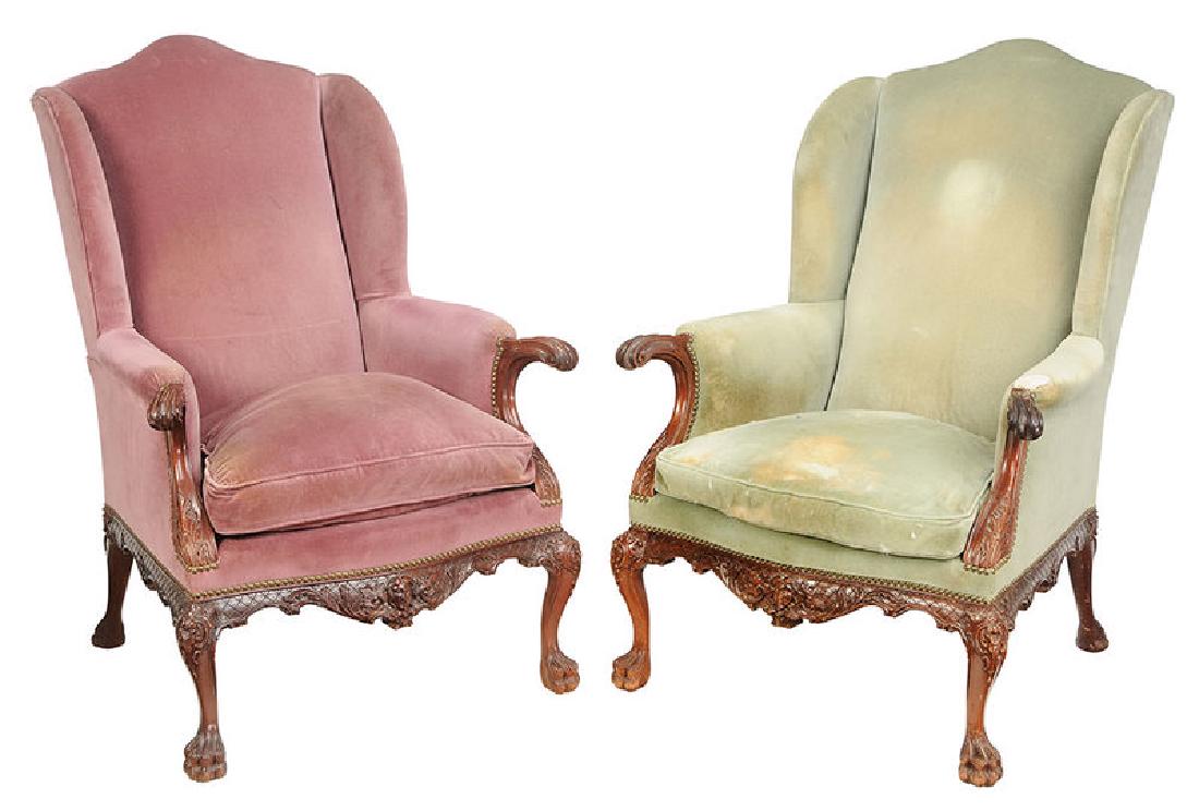 Pair Philadelphia Chippendale Style Easy Chairs: 20th century, after a chair at the Philadelphia Museum of Art, each mahogany with mask carved skirt, hairy paw feet, velvet upholstery, 43-1/2 in.