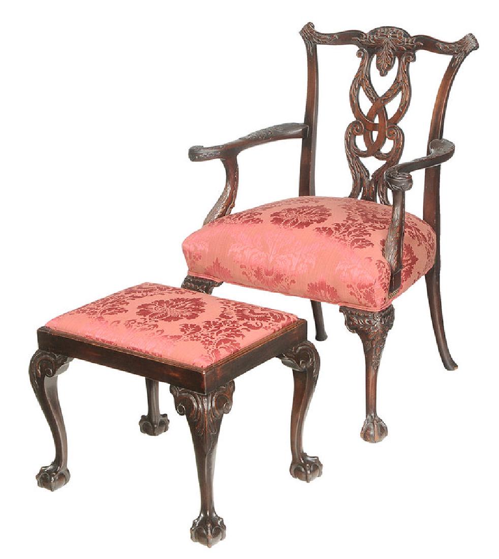 Chippendale Style Carved Arm Chair, Footstool: British, 19th/20th century, each mahogany frame set with matching silk damask upholstery, 39-1/2 in.