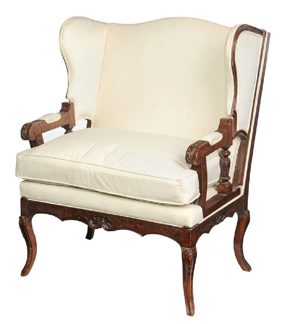 Provencial Louis XV Style Mechanical Easy Chair: French, 19th century, carved walnut frame with floral and leaf decoration, ratcheted back, cream muslin upholstery with loose down cushion, 42 in.