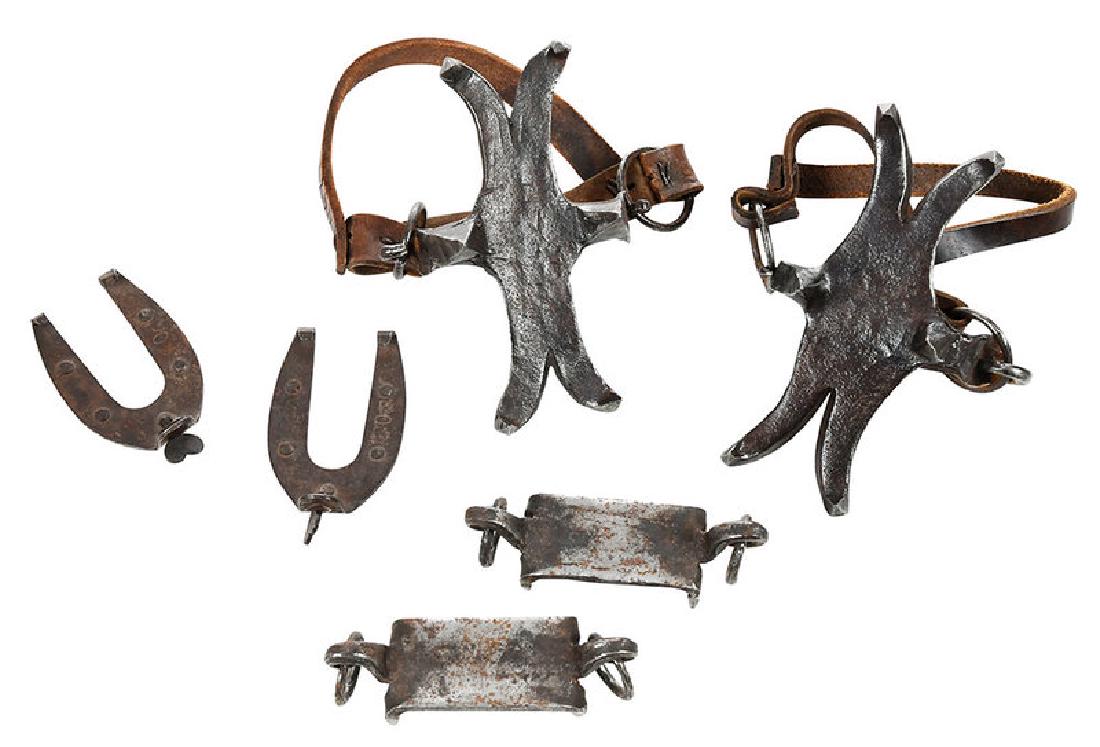 Three Pairs Ice Creepers or Cleats: probably American, 19th century, pair wrought iron, each with six spurs and leather straps, 6-1/4 in.; pair metal with four spurs and rings for straps, 4-1/2 in.; pair child's size horseshoe shaped cl