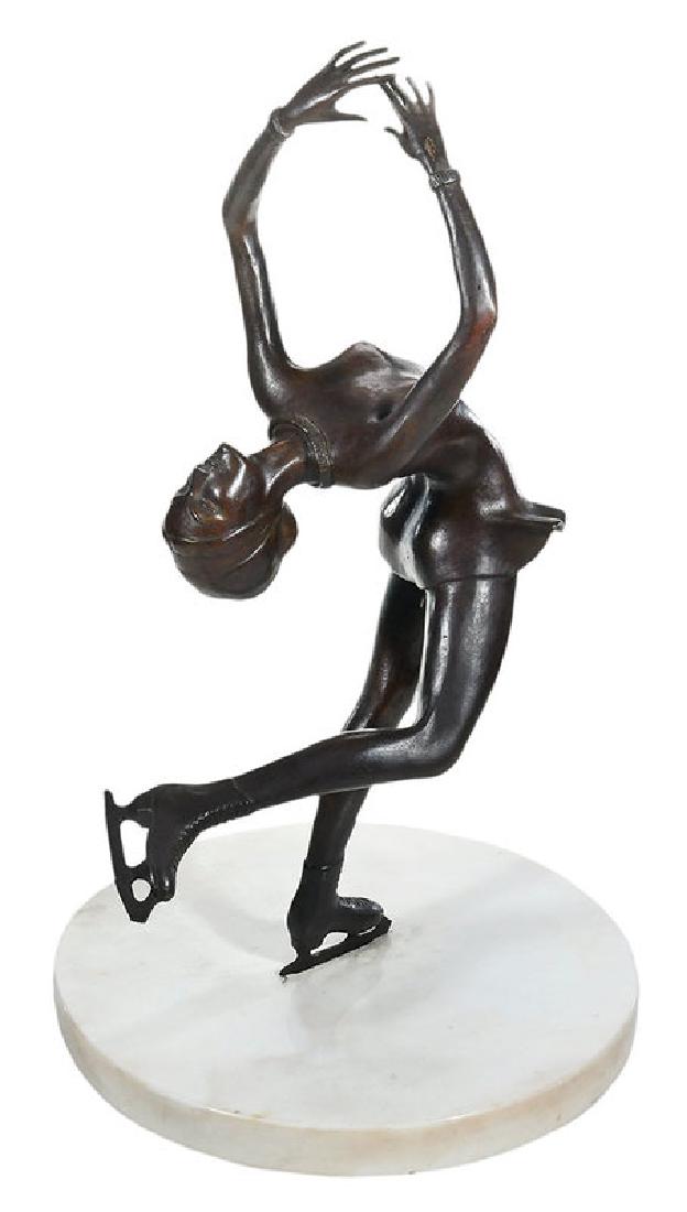 Fernand Fonssagrives: (French, 1910-2003) Peggy Fleming, edition 4/6, signed on side of base "FFonssagrives", patinated bronze on round, white marble base, 24-1/2 in. Note: This rare sculpture is the work of Fernand Fonssa