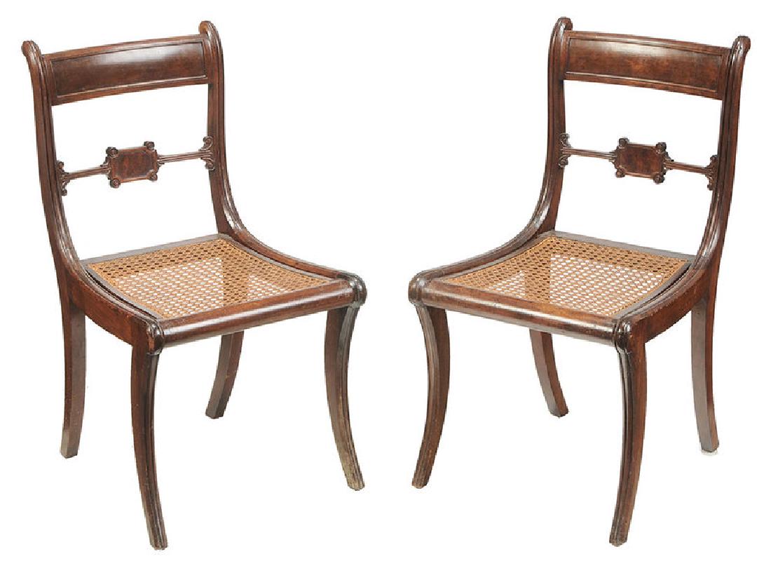 Pair Classical Mahogany Caned Seat Side Chairs: British/American, 19th century, Duncan Phyfe style, mahogany throughout, saber legs, 32-1/2 in.