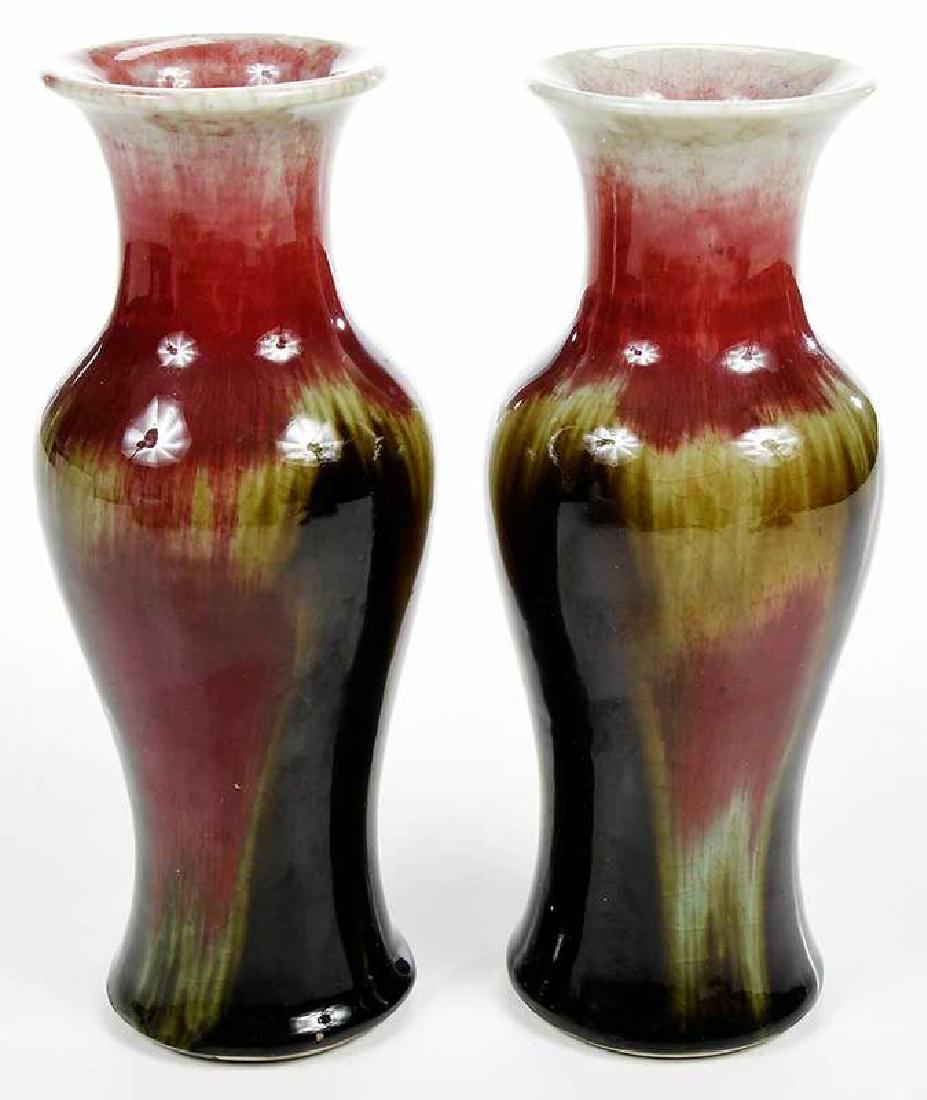 Near Pair Chinese Flambé Vases: Chinese, 19th century, crackled glaze, "blood of the bull" or flambé, one 8-3/4 in.; one blue underglaze at base, 8-15/16 in. Provenance: Private Collection, Middleburg, Virginia