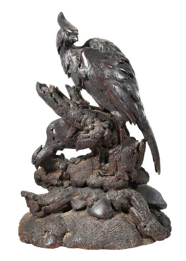 German School: (19th century) Untitled, two game birds, unsigned, carved mahogany, 18 x 13 x 7 in. Provenance: Private Collection