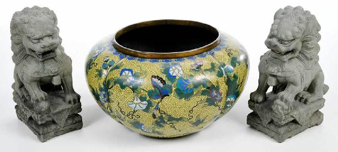 Pair Cast Stone Foo Dogs and Cloisonne Planter: 20th century, foo dogs, 9 in.,[minor wear, light stains]; lobed planter with butterfly decoration, 7 in., [minor surface losses to base, interior grime] Provenance: Private Collection