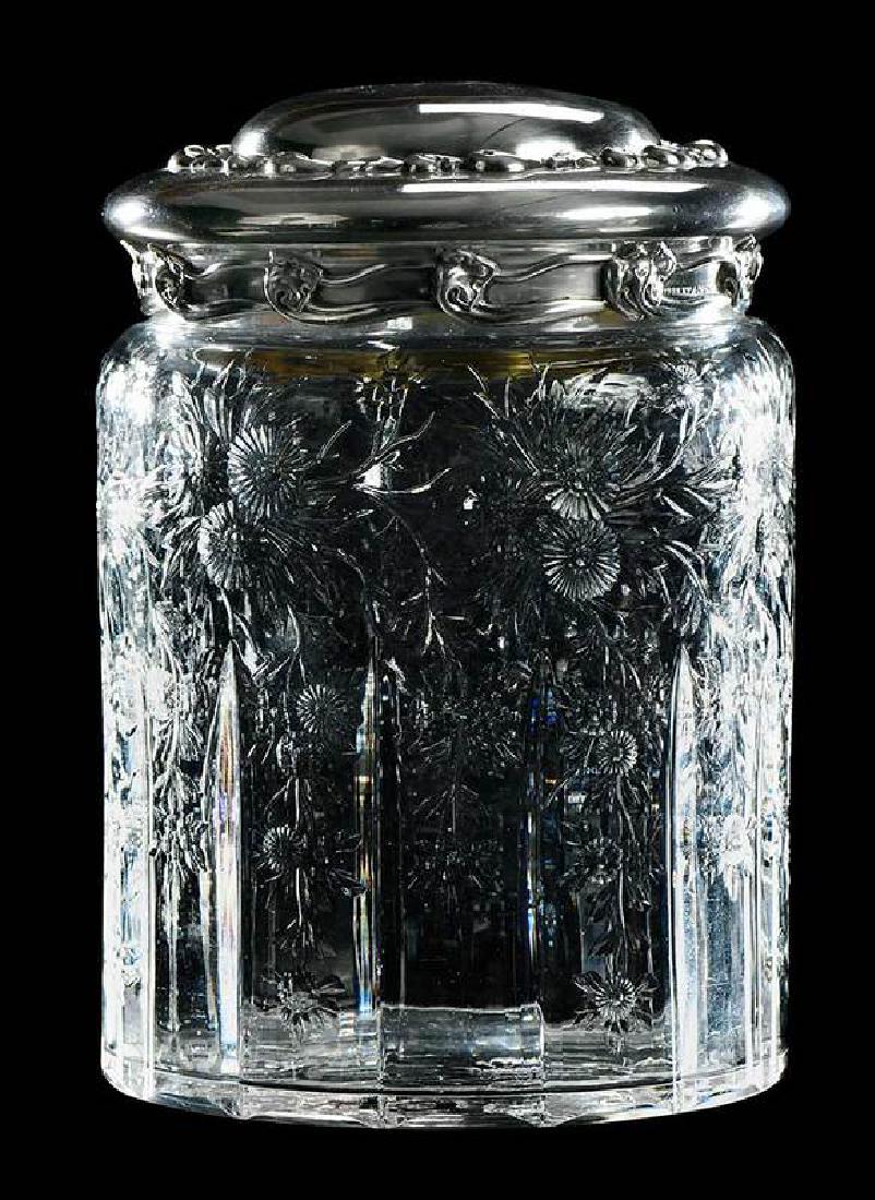 Intaglio Cut Biscuit Jar with Tiffany Lid: floral branch motif, possibly Stevens and Williams, Tiffany sterling lid, wave pattern with monogram, marked "Tiffany & Co. Makers Sterling Silver C 10", 8 in.