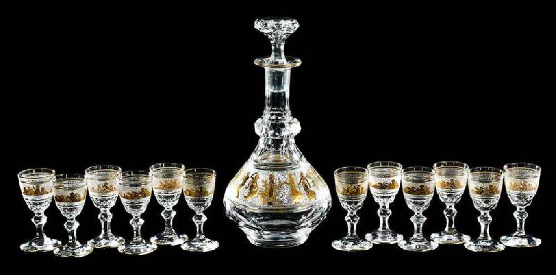 Val St. Lambert "Danse de Flore" Cordial Set: hand blown crystal decanter with gilded cameo decoration of a procession of classical figures, together with 12 cordials, gilded etched band of putti and animals, 10-1/4 in.; 3-1/2 in.