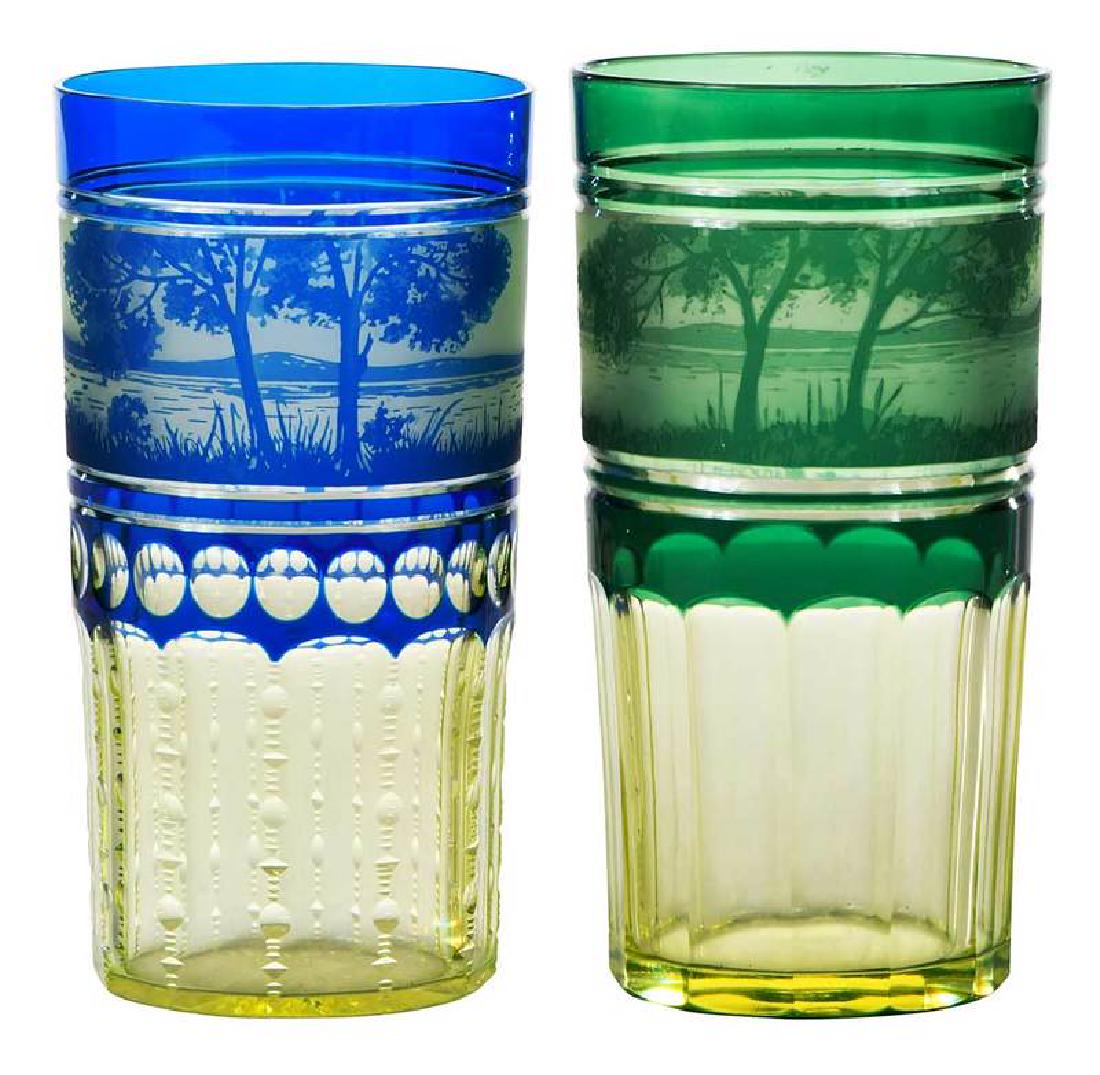 Two Val St. Lambert Cameo Landscape Tumblers: Belgian, circa 1900, one blue to citrine with band of cameo landscape, star cut base, 5-1/4 in.; one green to citrine with similar cameo landscape, 5-1/2 in., both unsigned