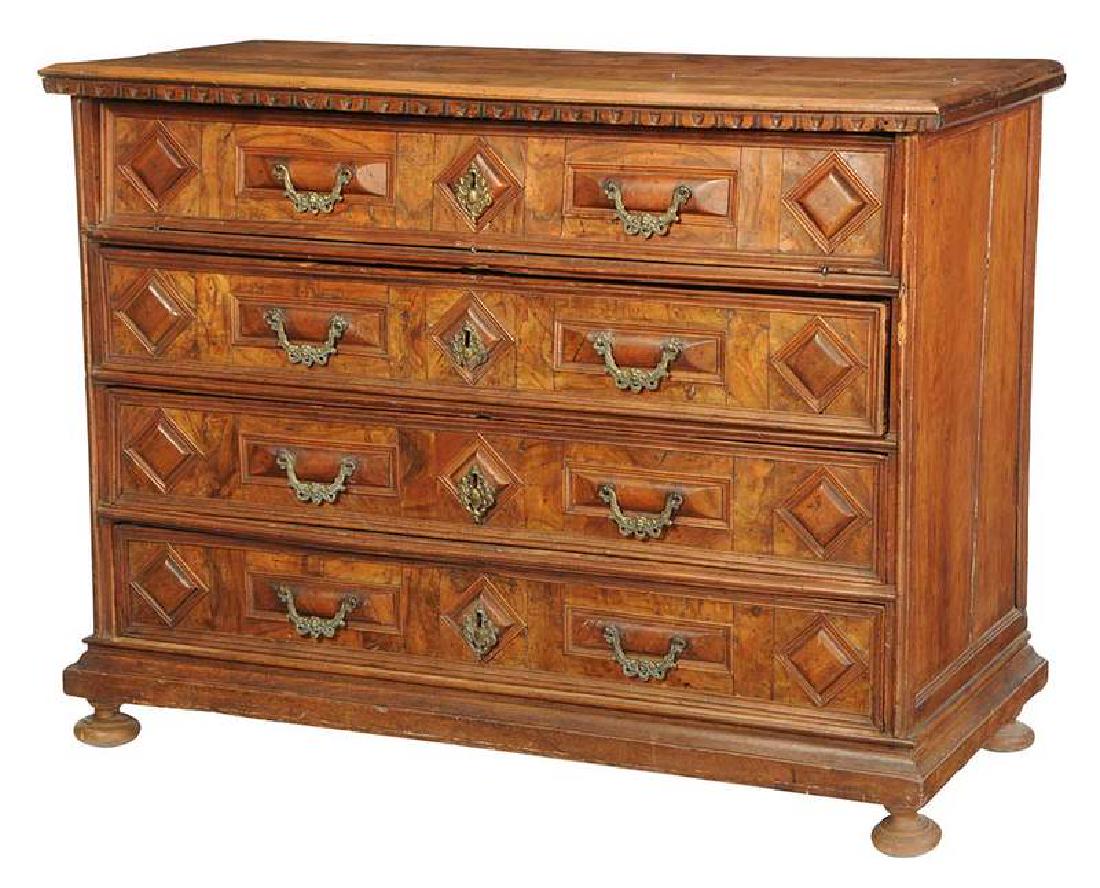 Italian Baroque Figured Walnut Chest: Continental, 18th century, hinged lid and upper drawer face opening to an interior desk fitted with ten drawers, over three long drawers, set with figural bronze pulls and escutcheons, paneled ca