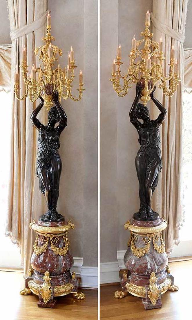 Pair Monumental Louis XV Style Figural Torchères: Continental, late 20th century, each gilt 13-branch candelabra held by a classical bronze maiden surmounted on a figured [rosso antico] marble base with ormolu mounts and paw feet, approximately 105 i