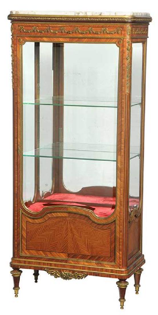 Fine Louis XVI Style Bronze-Mounted Cabinet: French, late 19th century, possibly François Linke (Paris, 1855-1946), [brèche violette] marble top, parquetry inlays, finely cast gilt bronze mounts, beveled gl