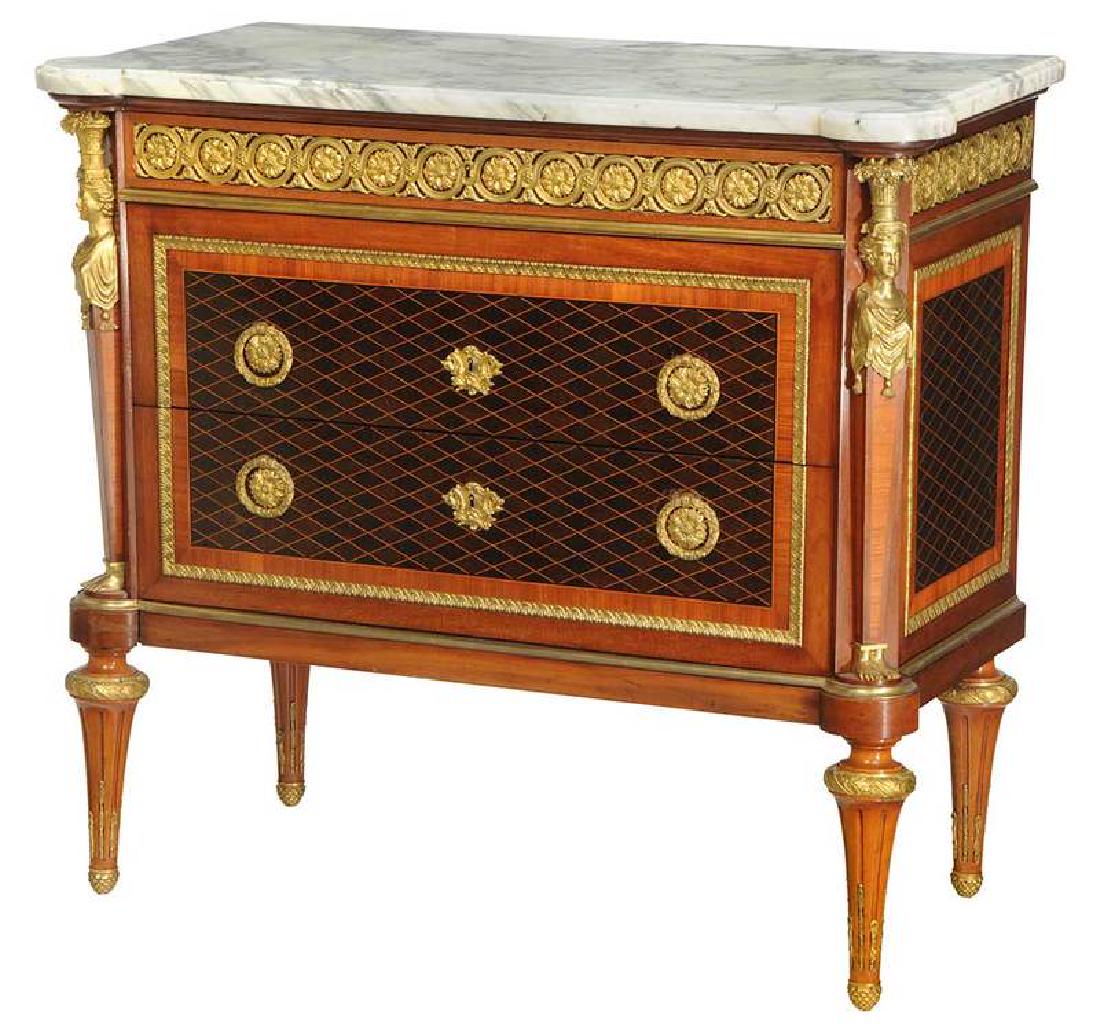 Louis XVI Style Marble-Top Three-Drawer Commode: French, 20th century, [Calacatta bianco] top over a gilt bronze mounted frieze drawer, over two parquetry and inlaid drawers, dovetailed drawers with flanked by figural bronze mounts, paneled backs, 3