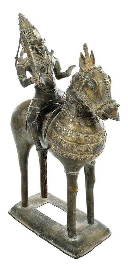 Bronze Mongolian Warrior on Horseback: Chinese or Middle Eastern, seated figure with large mustache and beard, saber in hand, astride a horse with relief ornamentation, 15 in. Provenance: Property From an Important Tennessee Living 