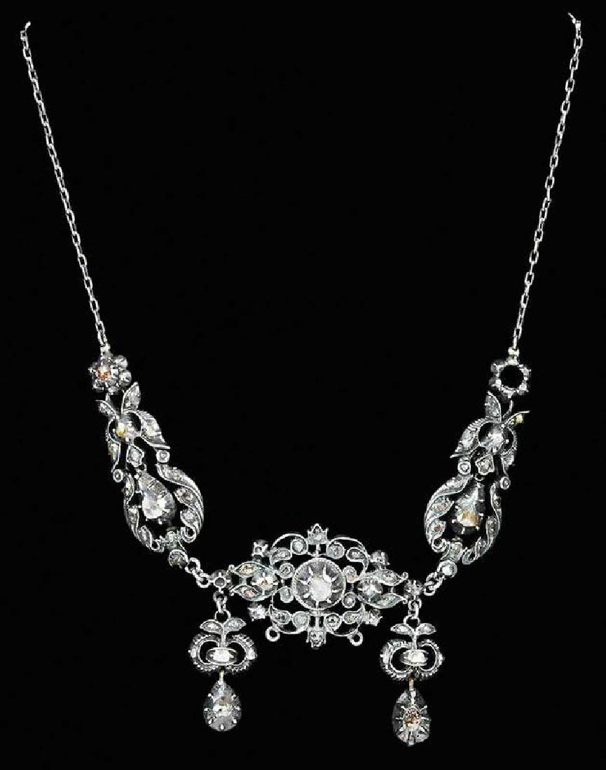 Antique Silver & Diamond Necklace: assorted rose and old mine cut diamonds, mostly yellow or champagne color, mounting tested various silver content .800 or less, clasp marked "925", 15 in. lg., 28.3 grams Provenance: Descended i