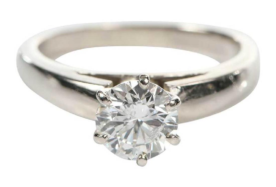 14kt. Diamond Ring: solitaire engagement ring, one round brilliant diamond estimated weight 1.18ct., J-K, I1, stamped "14K, MC", white gold, size 6-1/4, 4.5 grams, with appraisal Provenance: Private Collection