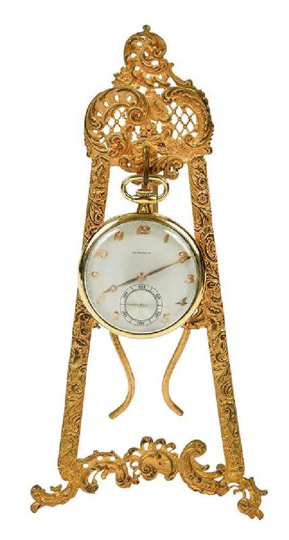 Longines 18kt. Pocket Watch: 44mm case, gold-tone Arabic numeral hour marks and hands, silver-tone dial, sub-seconds dial, inside back of case stamped "E.F.Co., Longines, 4307295" and with French eagle head hallmark, 18kt. yellow