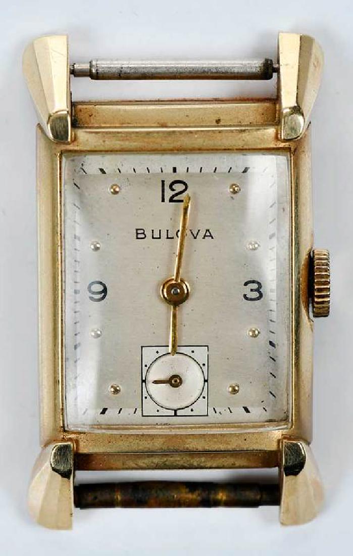 Bulova 14kt. Gold Movement: 28.5 x 21.5mm, sub-seconds dial, back of case stamped "14K Gold, Bulova, 6824252", yellow gold, no band, 23.8 grams