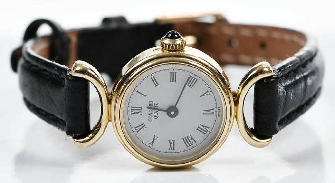 Concord 14kt. Gold Watch: 19mm dial, black Arabic numeral hour marks and hands, back of case stamped "2- 80 280, 417716, 14K", yellow gold, quartz movement, 8 in. lg., 14.6 grams