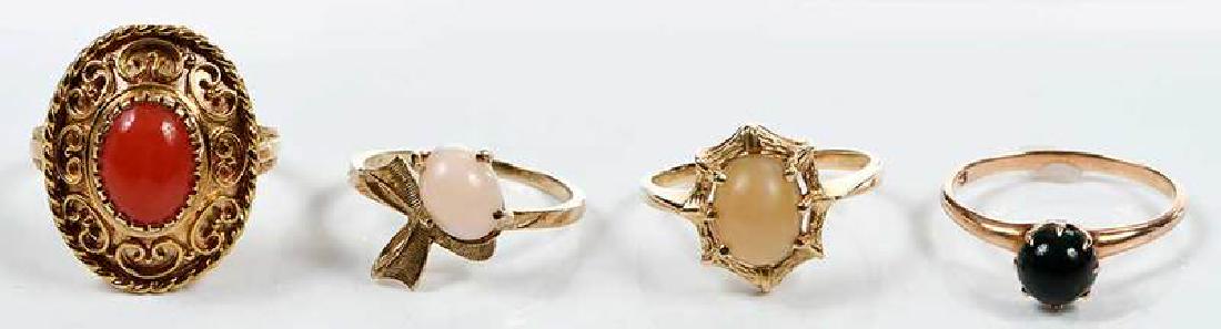 Four Gold & Gemstone Rings: cabochon gemstones including: orange carnelian, coral, bloodstone, cat's eye chrysoberyl, three 14kt. one 10kt., size 6 to 7, 13.9 grams