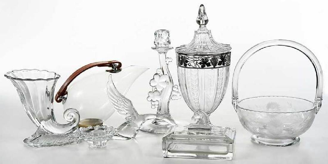18 Glass Tableware, Decorative Objects, Heisey: American/Continental, 20th/21st century, eight with impressed Heisey mark: Old Williamsburg candelabra, 10-1/2 in.; pair candelabra, 2-3/4 in.; scalloped torte plate, 12 in.; urn, vignette silver