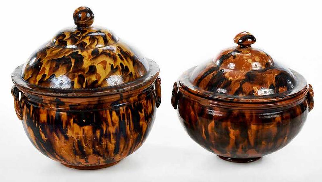 Two Large French Provincial Covered Pots: 20th century, brown and orange mottled glazed earthenware, applied handles, both with glazed interiors, attached labels for Camard Auctions, Paris, France, largest 13 x 12 in. , Provenance: Camard Auc