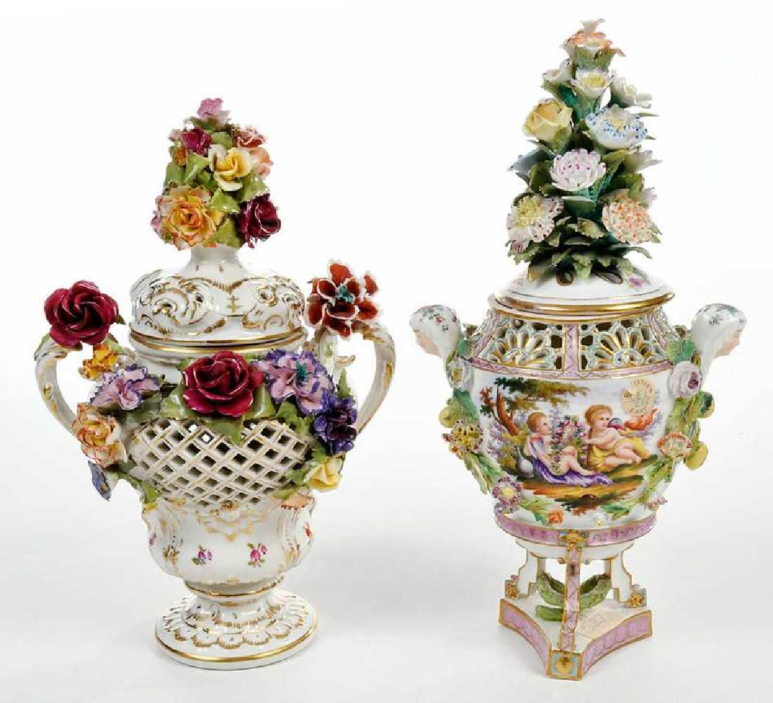 Two Floral Porcelain Lidded Potpourri Urns: Continental, 19th century, reticulated, comprising: Carl Thieme (German), marked, red stencil and hand painted, tall floral lid bouquet, labels inscribed "Christie's East/CEL 288/Oct 20 1981/527", 13-