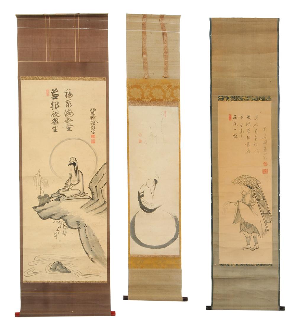 Three Japanese Scrolls with Figures, Moon: Hakuin Ekaku, (1685-1768), Hotei Pointing at Moon, sumi ink on paper, poem with artist signature and seals, scroll with wooden dowel and calligraphic box; Ekkei Osho, (1800-1885), Kannon Seated on a C