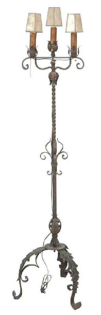Renaissance Revival Wrought Iron Torchere: early 20th century, scrolled frame with traces of gilt decoration, applied acanthus leaves, electric triple sockets, together with three capiz shell shades, 64 in. , Provenance: Robert Lee Humber