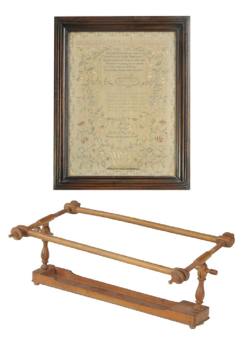 Basket Motif Sampler; Needlework Frame: probably New England, early 19th century, signed "Hannah Warder Aged Nine Years", silk on linen, later stained wood frame, 17-1/2 x 12-1/2 in. (sight); adjustable wooden embroidery frame, approximatel