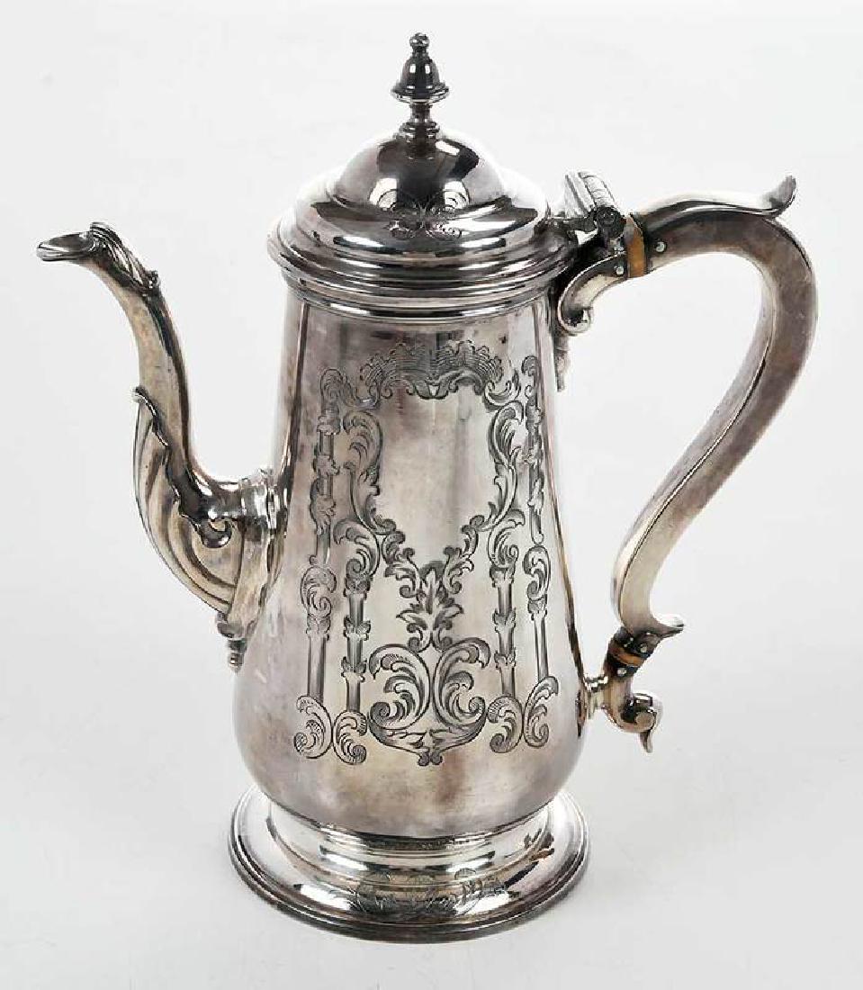 English Silver Coffee Pot: London, 1750, tapering sides, later engraved decoration, ivory spacers, marks for William Shaw II and William Preist, 25.20 oz. T., 9-1/4 in. Note: