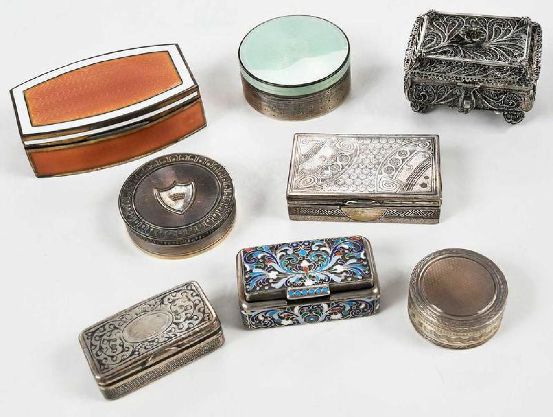 Eight Continental Silver Boxes: two French, gilt silver, round with engraved decoration; four Russian silver: one filigree and one with enamel decoration and two niello decoration; one Austrian Hungary, enamel and gilt silver, recta