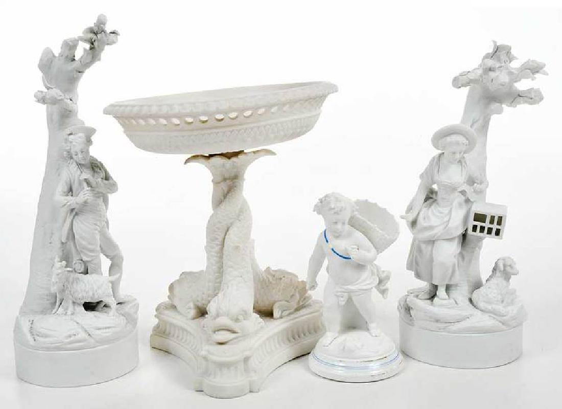 Four Bisque Figural Porcelain Decorative Objects: British/Continental, 19th/20th century, comprising: centerpiece bowl on an inwoven dolphin pedestal; two similar figurines; together with putto with basket figurine, 9 in. , Provenance: Private Collec