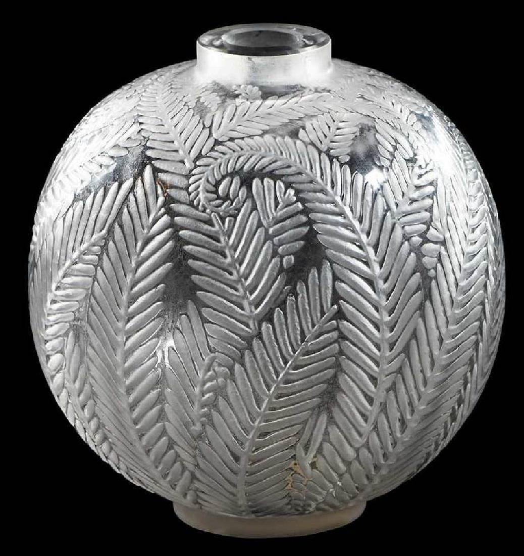 R. Lalique Palmes Frosted Vase: model introduced 1923, model number 952, molded "R.LALIQUE/MADE IN FRANCE", 4-3/4 in. , Provenance: Estate of Dr. Philip George, Memphis, Tennessee