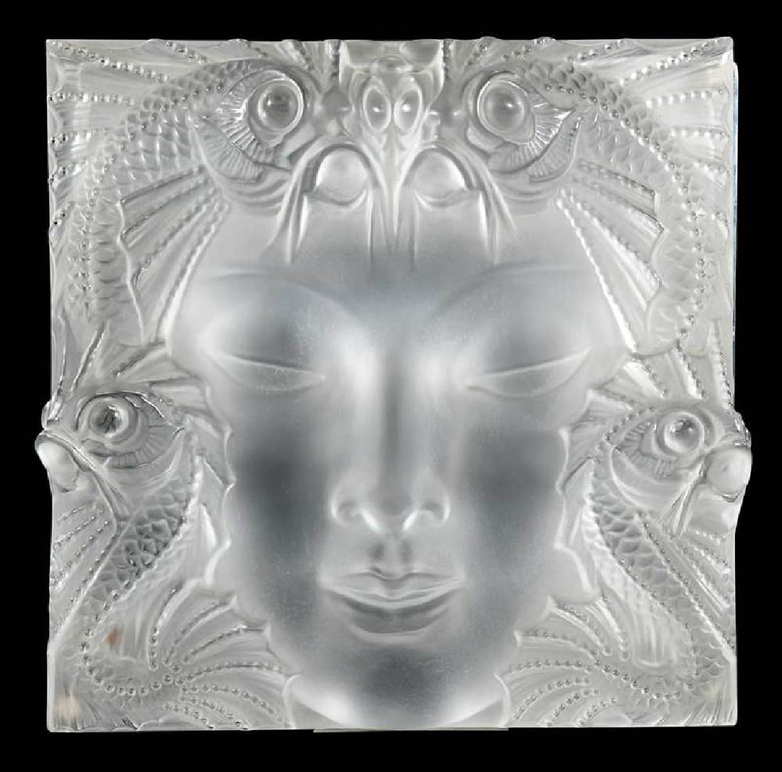 Lalique Masque de Femme Decorative Plaque: indistinct engraved mark, with metal stand, 12-1/2 in. x 12-1/2 in. x 2-1/2 in. , Provenance: Estate of Dr. Philip George, Memphis, Tennessee
