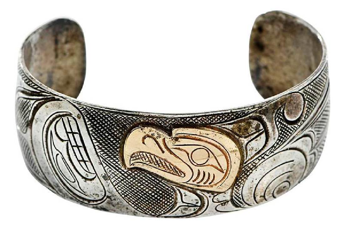 Northwest 14kt. Gold and Silver Cuff Bracelet: bird design, engraved "PAS", tested 14kt. yellow gold and sterling silver, 1 in. wide, 5-3/4 in., 36.9 grams , Provenance: Estate of Alice Carter Middendorf