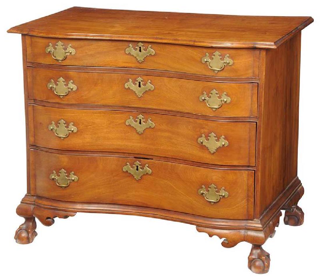 American Chippendale Mahogany Serpentine Chest: Boston area, late 18th century, blocked and serpentine single board top, four conforming dovetailed drawers, original ball and claw feet, scrolled returns, white pine secondary, 31-3/4 x 38-1/2 x 22-1