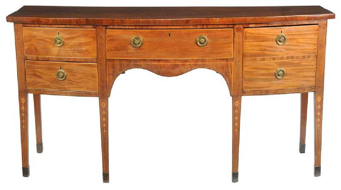 Signed George III Inlaid Mahogany Sideboard: British, stamp mark at top of center drawer "from W. Williamson & Sons, Guildford" circa 1800, central drawer flanked by two drawers and a single deep drawer with false double front, bellflower inlaid