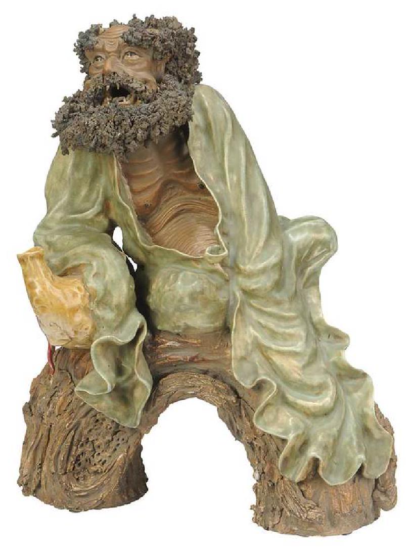 Shiwan Pottery Figure of Immortal: Chinese, 20th century, large figure of Li Tieguai seated on a tree stump and holding his wine gourd, glazed and unglazed earthenware, inscription and Chinese seal mark verso, 18 in. , Provenance: