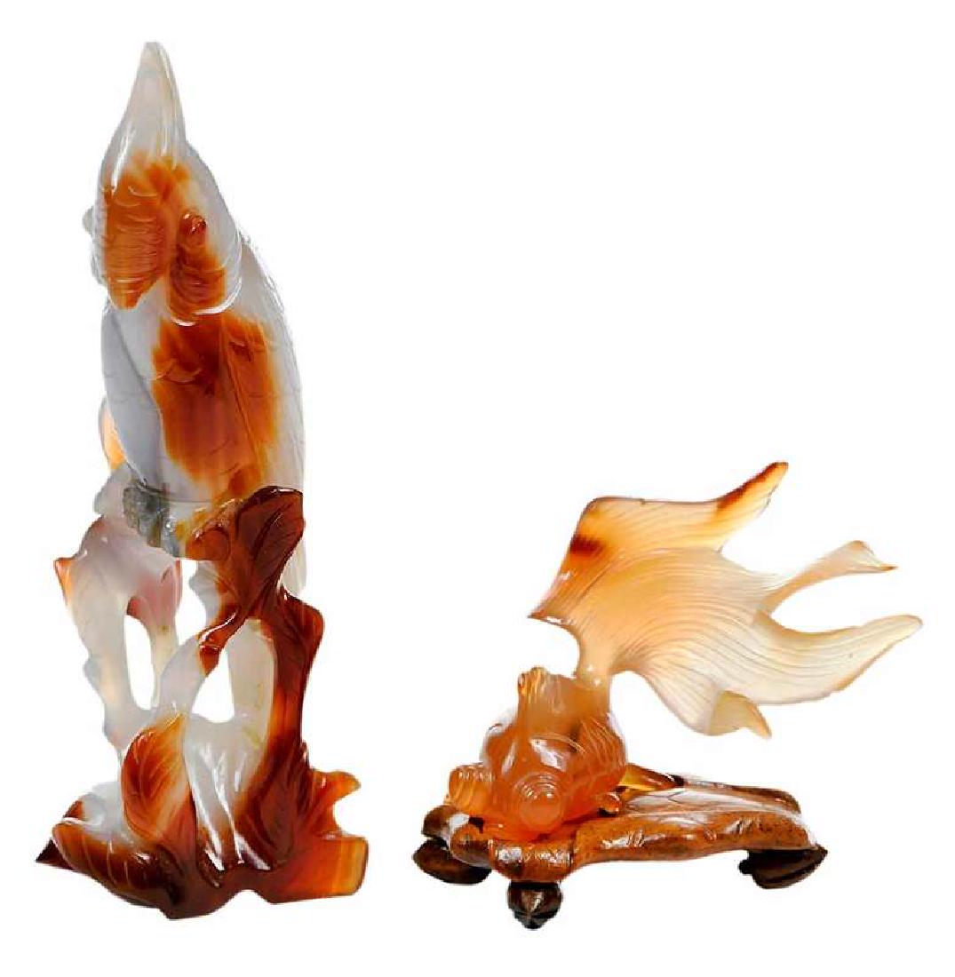 Two Chinese Hardstone Carvings: russet bird and orange fish with stand, tallest 5-1/2 in., Provenance: Estate of Mary Ann Bresee, Orange Park, Florida