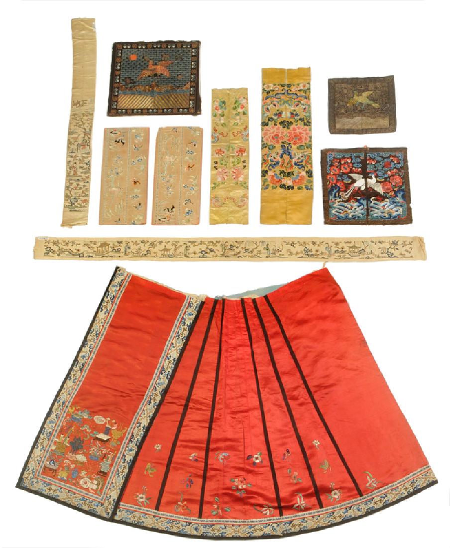 Eight Chinese Silk Embroideries: late 19th/early 20th century, red skirt, 33 x 28 in.; three rank badges with couched metallic thread, largest 13 x 13-1/2 in.; pair yellow silk floral embroideries, 25 x 7 in. together; two matching e