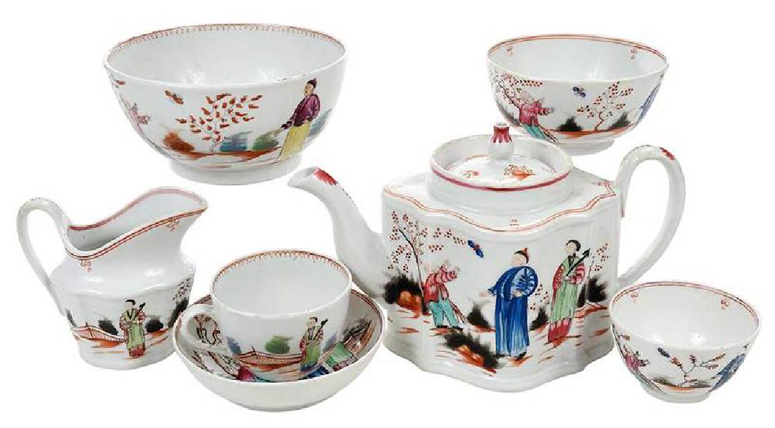 28 Piece Minton Chinoiserie Tea Service: Staffordshire, England, marks for 1847, comprising: teapot, 6 in.; creamer, 4 in.; open sugar, 2-1/2 in.; two waste bowls, 3 in.; five handled teacups, 2-3/8 in.; seven teacups in the Chinese taste, 2