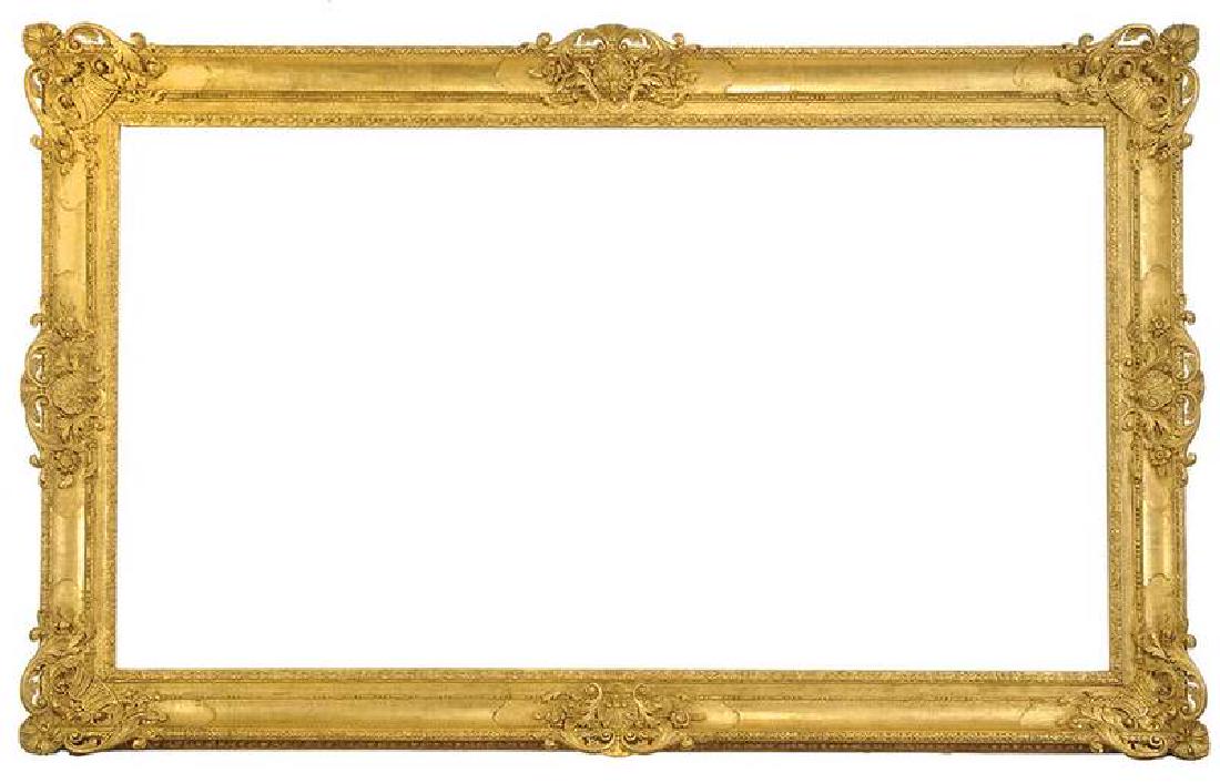 Fine Monumental Regency Style Frame: blossom, shell and acanthus corner and central decorations between "mirror panels", first quarter 20th century, rabbet 97-1/4 x 51-3/4 in., exterior 111 x 65-1/2 in., 8 in. wide, 4 in. deep This lot f