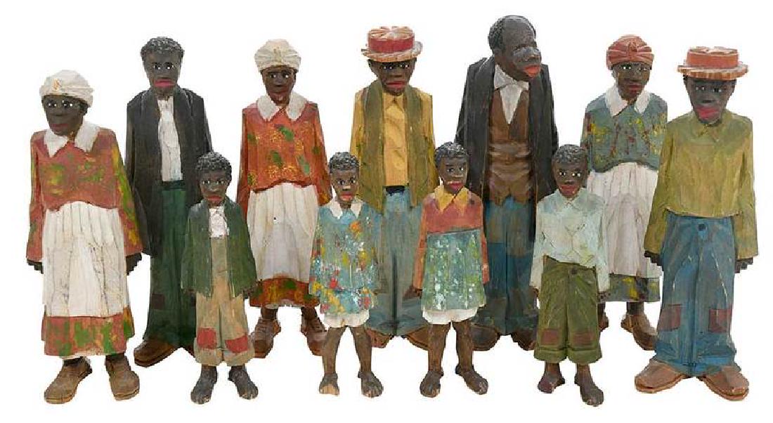 11 Adrian Woodall Carved Figures: Adrian R. Woodall, American, 1888-1969, carved and polychrome African American figures, most signed ARW in pencil on bottom of feet, tallest 6-1/2 in.