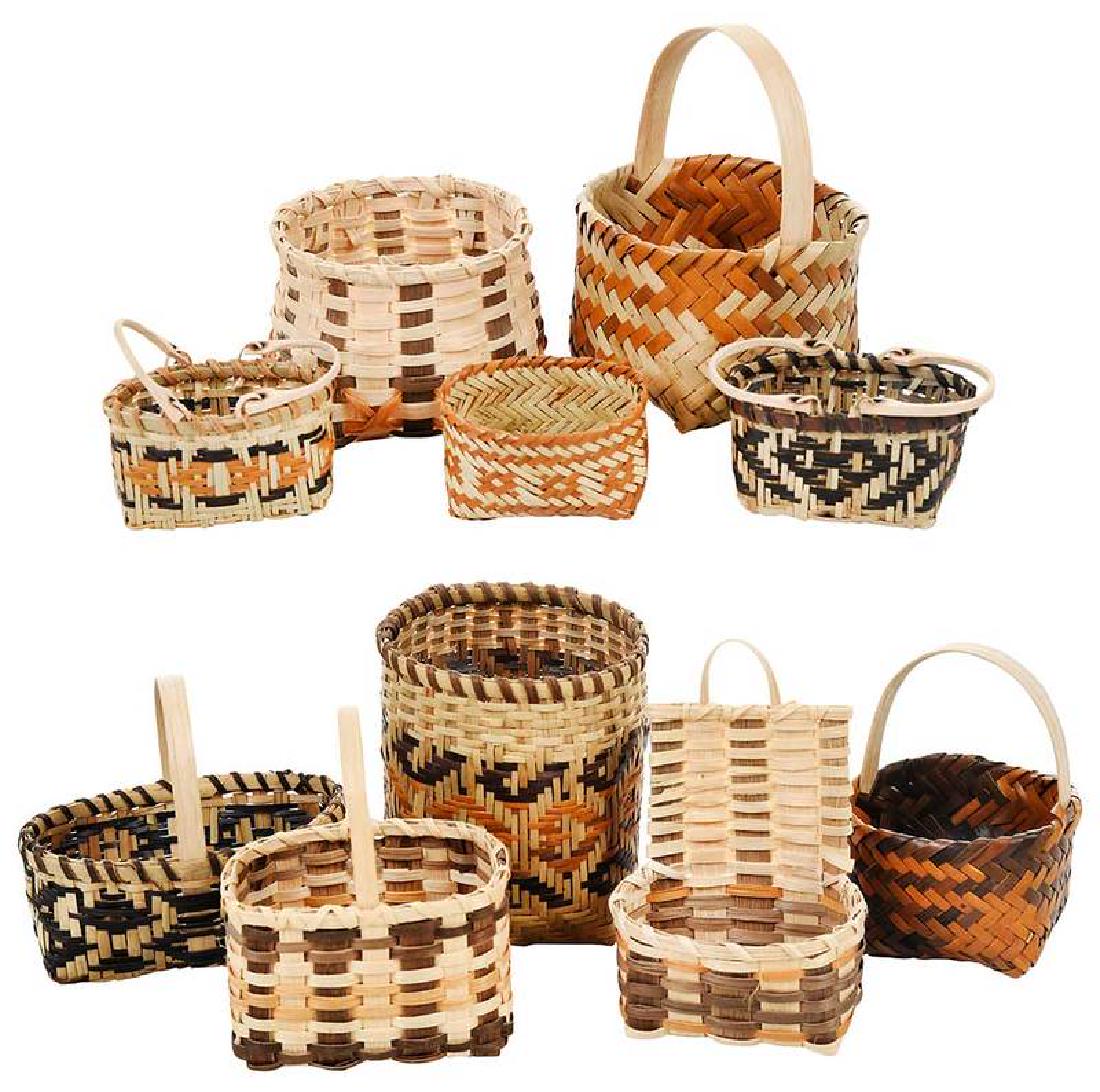 Ten Miniature Cherokee Baskets: Qualla Boundary, North Carolina, seven river cane including two double weaves with handles; one miniature storage and four purse baskets attributed to Ramona Lossiah (three with Medicine Man Indian Cr