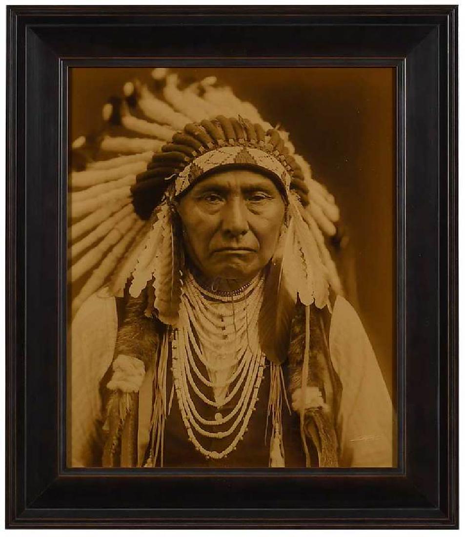 Edward Sherrif Curtis: (American, 1868-1952)Chief Joseph, contemporary "Goldtone", printed in 2002 from a 1903 negative, Curtis Centennial project, edition 70/250 (label verso), bears digital signature and copyrig