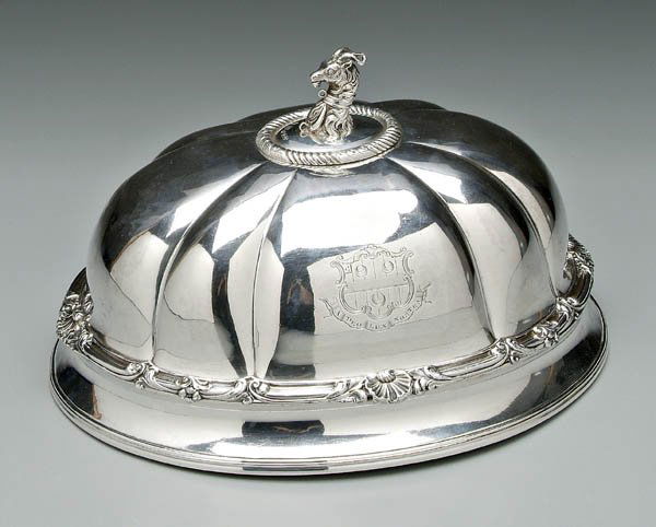 Crestwick Sheffield meat cover,: oval body, scroll and shell border, English silver finial of goat with [gorget], family crest with three [gorgets], Old Sheffield plate, marks for "T.J. Crestwick", finial English silver, marks for Sh