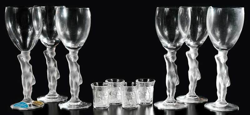 Four Lalique Enfants Glasses, Six Wine Glasses: shot glasses, engraved "Lalique France", 2-7/8 in.; wine glasses, one with "Castle Art Crystal" label, 7-1/2 in. Provenance: Estate of Dr. Philip George, Memphis, Tennessee