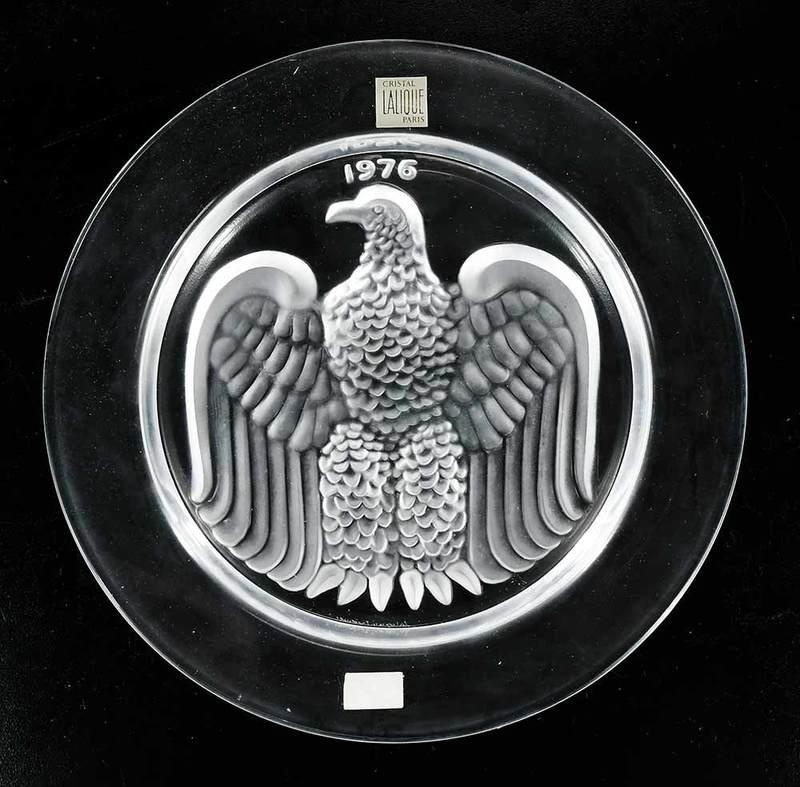 Boxed Set 12 Annual Lalique Plates: 1965-1976, all engraved "Lalique France", 8-1/4 in. diameter Provenance: Estate of Dr. Philip George, Memphis, Tennessee