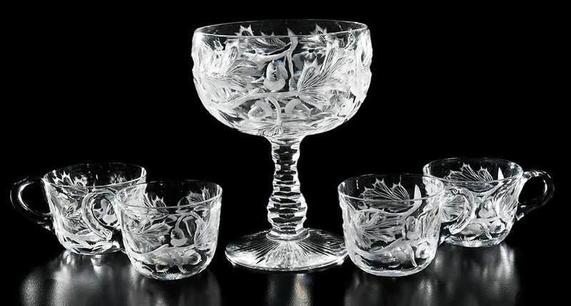 Five Brilliant Period Cut Glass Items: stylistic arrangement of acorn and oak branches, four punch cups, 2-1/4 in.; chalice, honeycomb pattern stem, 6-1/2 in. Provenance: Private Collection, Cary, North Carolina