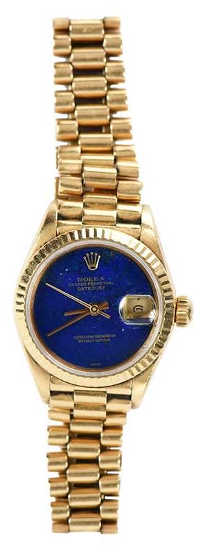 Rolex 18kt. Datejust Watch: 26mm case, lapis lazuli dial, gold-tone hands, date window, fluted bezel, model #69178, serial # 9137109, movement #2135, 18kt. yellow gold, on Rolex gold link band, 6-3/4 in. inside, 68.5 grams, with